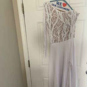 Hand made dress by VersaillesBklyn boutique.